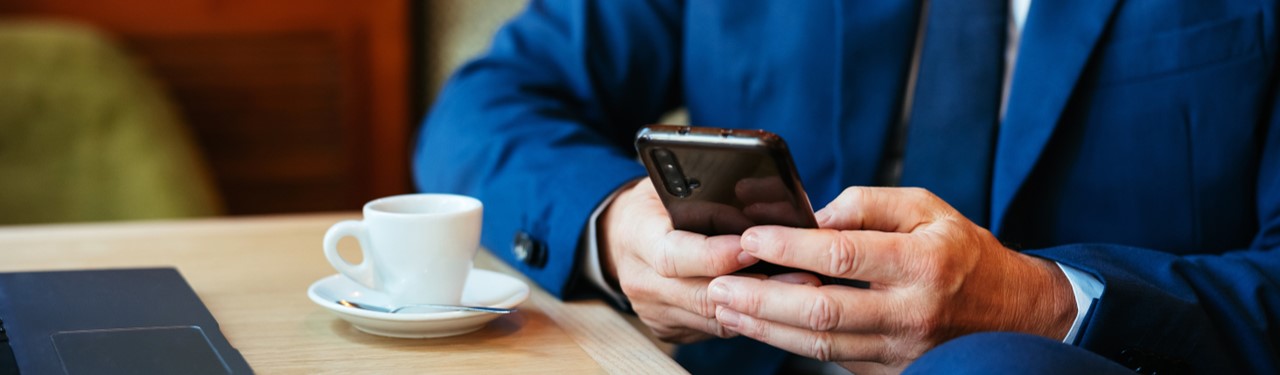 Person holding a mobile device